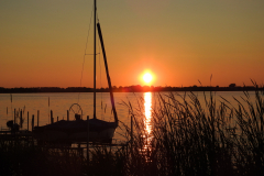 A Sailboats Sunset on the Lake
